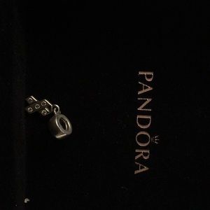 Pandora breast cancer awareness charm.